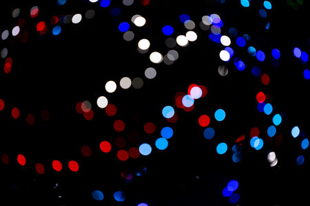 Blurred view of the lights on the Christmas treeの写真素材