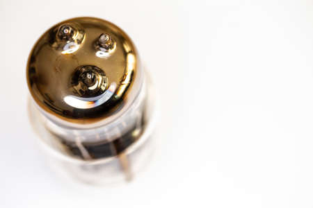 Large power electron tube for HiFi audio amplifier. Artificial light from above, top shot of the...