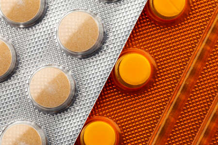 Close up of pills in blisters. Photo taken under artificial light