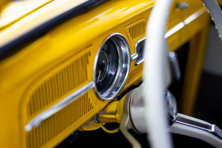Restored yellow classic car interior. Photo taken in natural light.の写真素材
