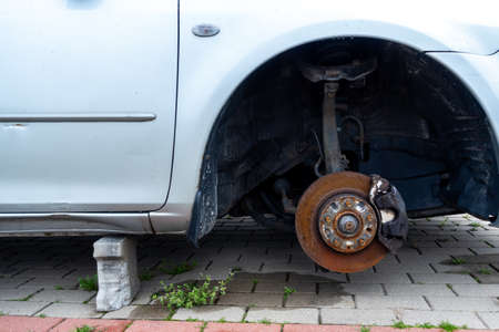 Rusty brake discs on an abandoned car. Object illuminated with soft, natural lightの写真素材