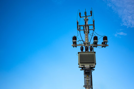 15kV power transformer on top of the electic pole. Local network of power supply.の写真素材