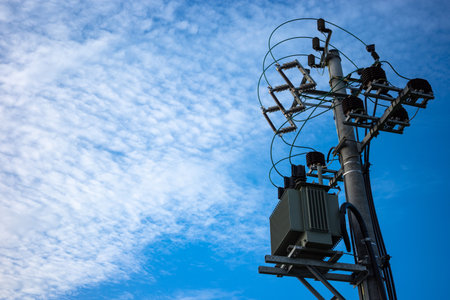 15kV power transformer on top of the electric pole. Local network of power supply.