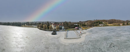 rainbow in winter over the commune of Zebrzydowice in Poland in Silesia from a bird's eye viewの写真素材