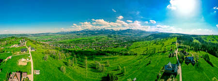 Podhale and the Tatra Mountains in Poland, bird's-eye view in springの写真素材