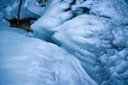 Ice figures and forms in mountains, cold winter light