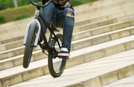 young biker riding a bmx bicycle