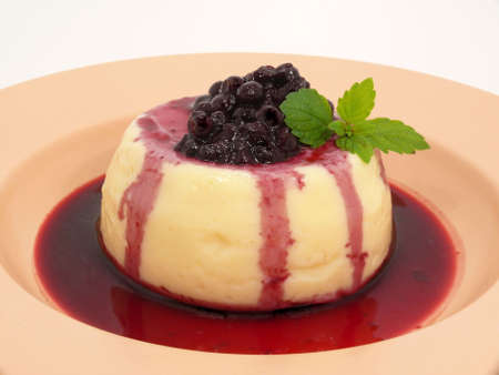 Vanilla pudding with bilberriesの写真素材