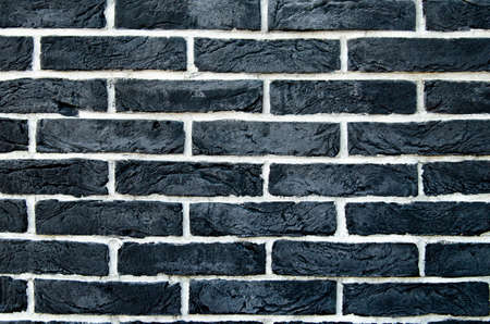 Background of black bricksの写真素材