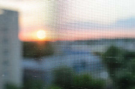 mosquito net in windowの写真素材