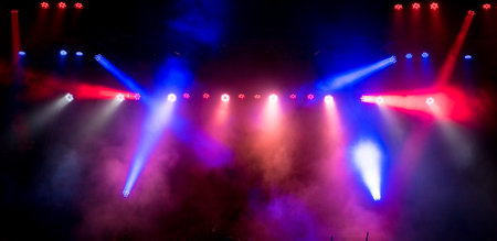 stage lights. Several projectors in the dark.の写真素材