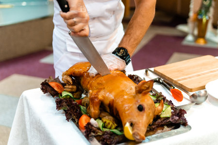 Baked pork shank with sauerkraut and beer on a wooden table. german food. October recipe for festival. banner, menu recipe.の写真素材