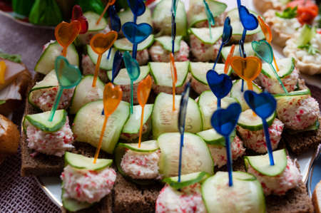 bread with white sauce and cucumber.の写真素材