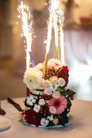 Cake with flowers and Fireworks.の写真素材