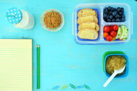 Healthy lunch for back to school in flat lay with room for textの写真素材