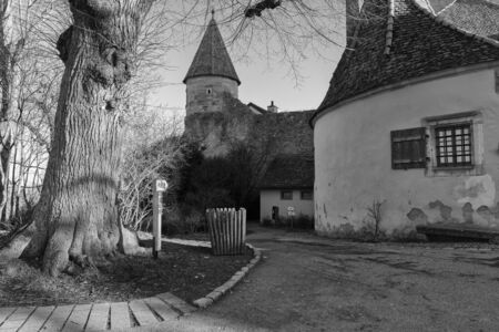 Rothenburg ob der Tauber, Germany - 18 February 2019: The streets of Rothenburg, Bavaria is federal state of Germany. Black and white shots of wintry, deserted Rothenburgのeditorial素材