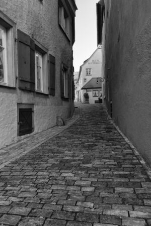 Rothenburg ob der Tauber, Germany - 18 February 2019: The streets of Rothenburg, Bavaria is federal state of Germany. Black and white shots of wintry, deserted Rothenburgのeditorial素材