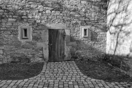 Rothenburg ob der Tauber, Germany - 18 February 2019: The streets of Rothenburg, Bavaria is federal state of Germany. Black and white shots of wintry, deserted Rothenburgのeditorial素材