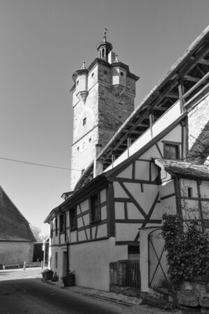Rothenburg ob der Tauber, Germany - 18 February 2019: The streets of Rothenburg, Bavaria is federal state of Germany. Black and white shots of wintry, deserted Rothenburgのeditorial素材