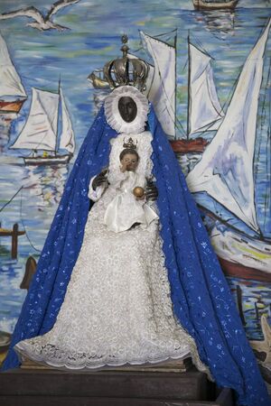 Havana, Cuba - 12 January 2013: Views of town center of squares and streets. A figure of the black Madonna in cuban church. Protector of the sailors.のeditorial素材