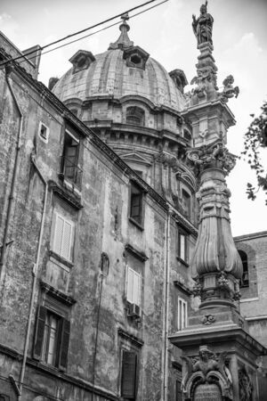 Naples, Italy - August 08, 2015 : Narrow streets of Naples, black and white photographs. Bottom view of a cathedral of the old town.のeditorial素材