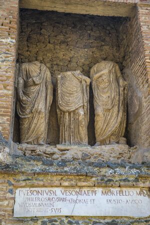 POMPEII, ITALY - 8 August 2015: Ruins of antique roman temple in Pompeii near volcano Vesuvius, Naples, Italy. Some statues and obelisks of Pompejiのeditorial素材
