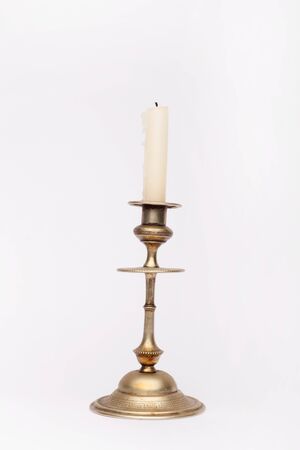 Renaissance brass candlestick on the white background, isolatedの写真素材