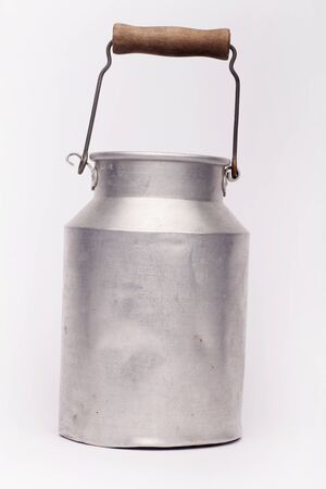 Old aluminum milk container on the white background, isolatedの写真素材