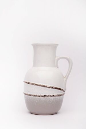 Old white vase  on the white background, isolatedの写真素材