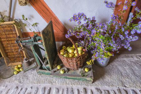 Bad Windsheim, Germany - 16 October 2019: View on the stone floor and autumn decoration with flowers, pumpkins and fruitsのeditorial素材