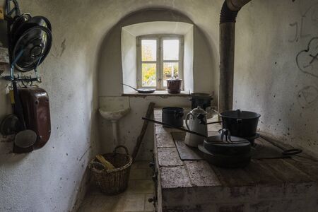 Bad Windsheim, Germany - 16 October 2019: Interior views of a german village house. View of an old, antique kitchen stoveのeditorial素材