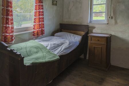 Schwaebisch Hall, Wackershofen, Germany - 15 October 2019: Interior views of a german village house. View in a german peasant bedroomのeditorial素材