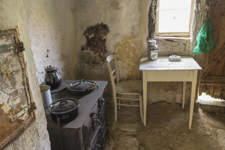Schwaebisch Hall, Wackershofen, Germany - 15 October 2019: Interior views of a german village house. View of an old, antique kitchen stoveのeditorial素材