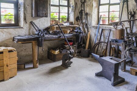 Schwaebisch Hall, Wackershofen, Germany - 15 October 2019: View in a blacksmits, smith workshop with...