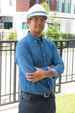 architect with hard hat at construction siteの写真素材