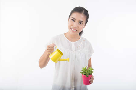 portrait of pretty woman wateringの写真素材