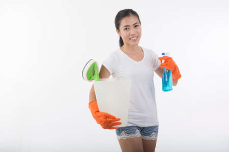 woman carry cleaning equipment