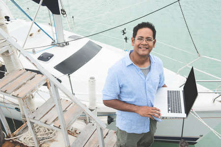 asian traveler at the Yachting portの写真素材