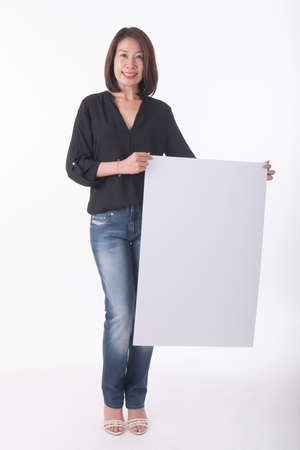 asian woman show blank white boardの写真素材