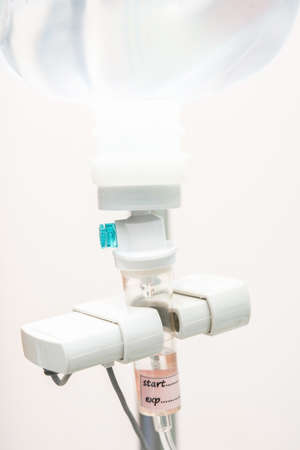 Close up saline IV drip for patient and Infusion pump in hospital