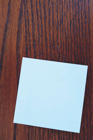 blank note paper on vintage wood wall
