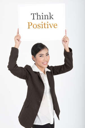 business woam show sign with word think positiveの写真素材