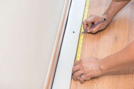 hand cutting plasterboardsの写真素材