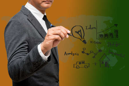 business man drawing business ideasの写真素材