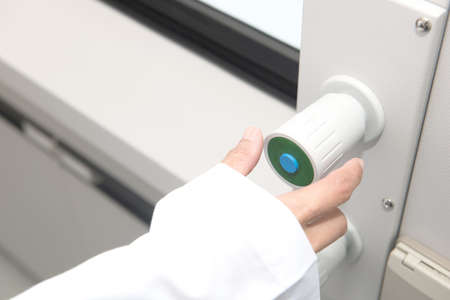 Scientist hand working at pharmacy microbiology laboratory