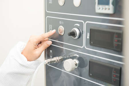 Scientist hand working at pharmacy microbiology laboratory