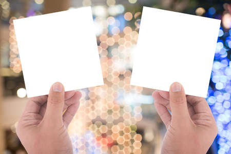 two hand hold blank card on blur backgroundの写真素材