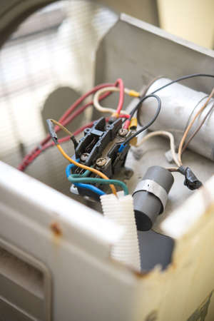 Air Conditioning Technician install new air conditioner.の写真素材