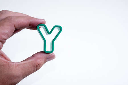 hand hold plastic alphabet Yの写真素材