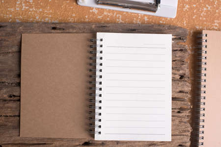 blank note book on tableの写真素材